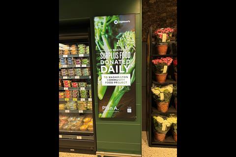 Signs about surplus food donation at M&S, Galleries Washington, Tyne & Wear